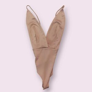 Women’s pink Charolette Russe Body Suit buttons Criss Cross Back shirt straps